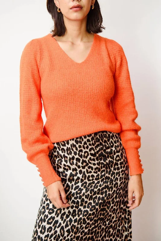 Women's Holiday Pullovers-Protia V-Neck Sweater In Orange